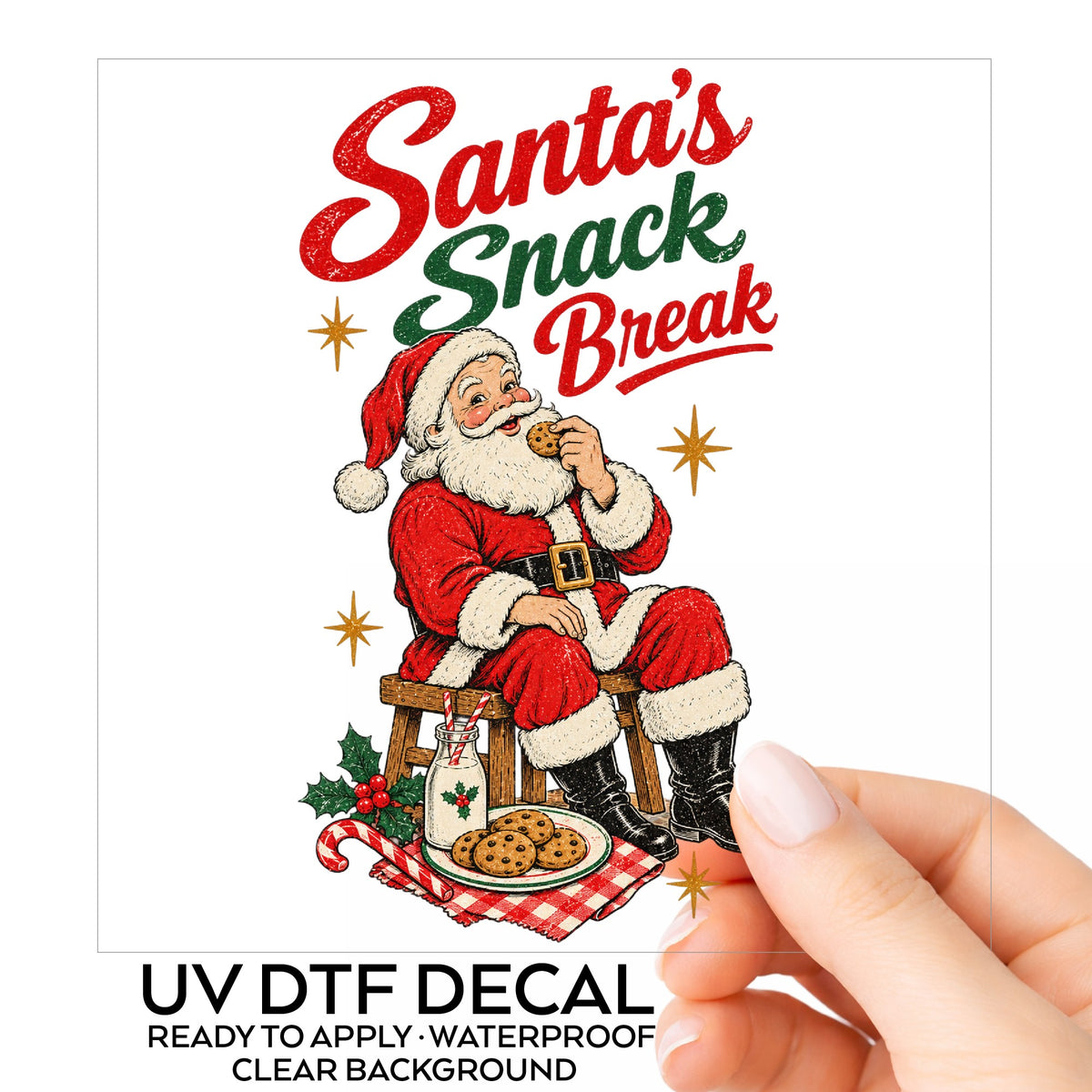Santa's Snack Break Cookies UV DTF sticker on its backing card, held in hand