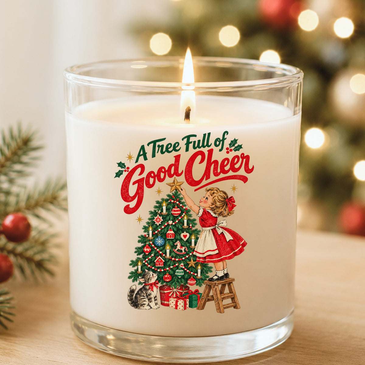 A Tree Full Of Good Cheer UV DTF sticker applied to a white candle in a glass holder near Christmas lights
