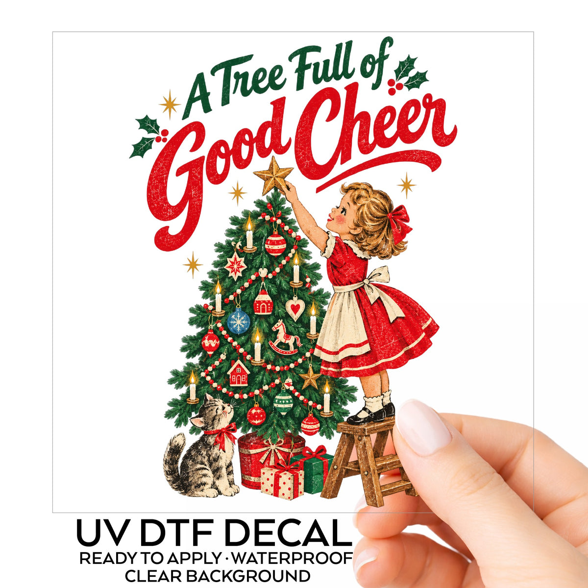 A Tree Full Of Good Cheer UV DTF sticker on its backing card, held in hand