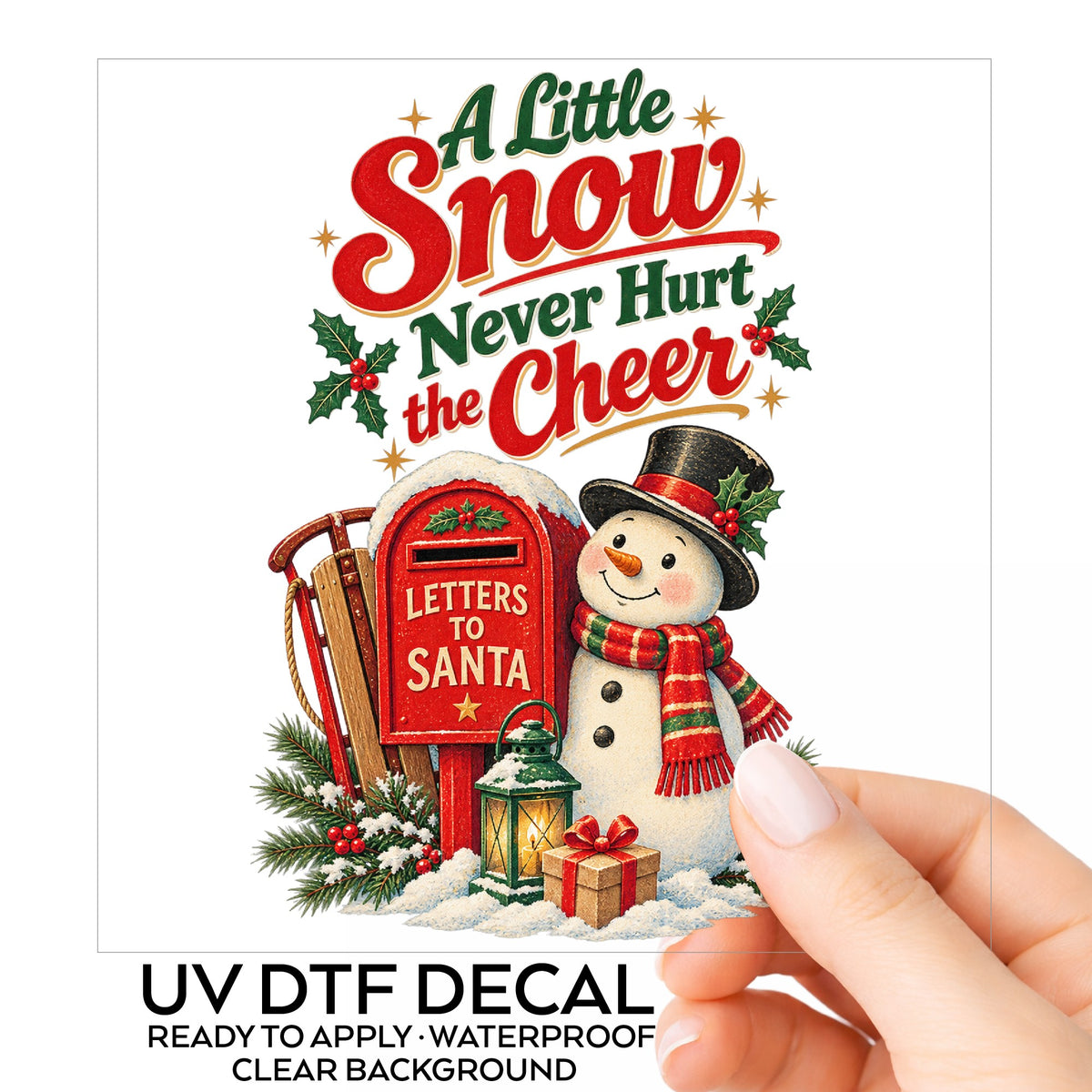 A Little Snow Never Hurt The Cheer Snowman UV DTF sticker on its backing card, held in hand