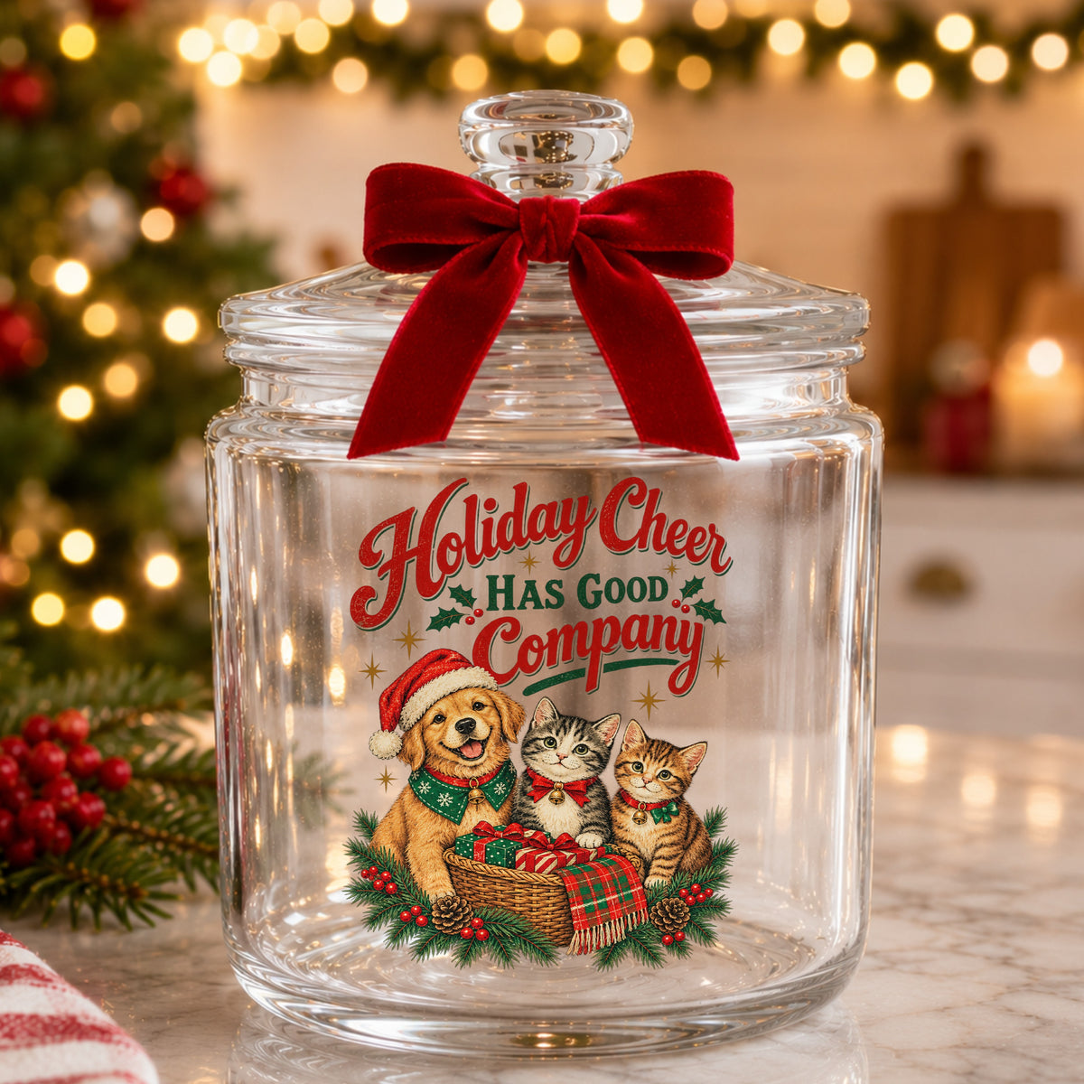 Holiday Cheer Has Good Company Puppy Kittens UV DTF sticker applied to a glass candy jar tied with a red bow