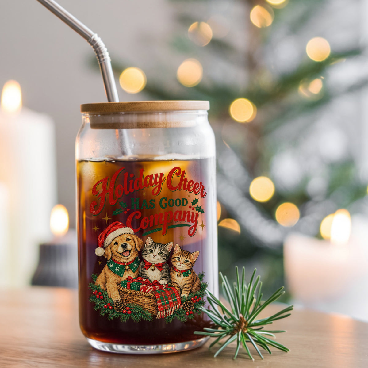 Holiday Cheer Has Good Company Puppy Kittens UV DTF sticker applied to a glass can cup of iced coffee with a straw