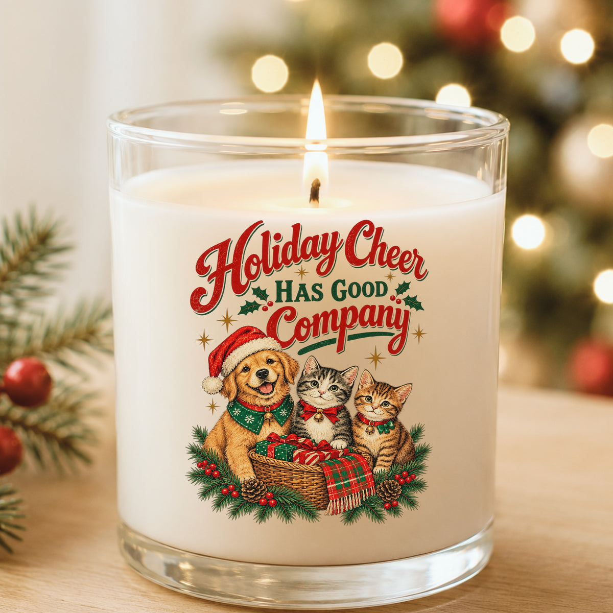 Holiday Cheer Has Good Company Puppy Kittens UV DTF sticker applied to a white candle in a glass holder near Christmas lights