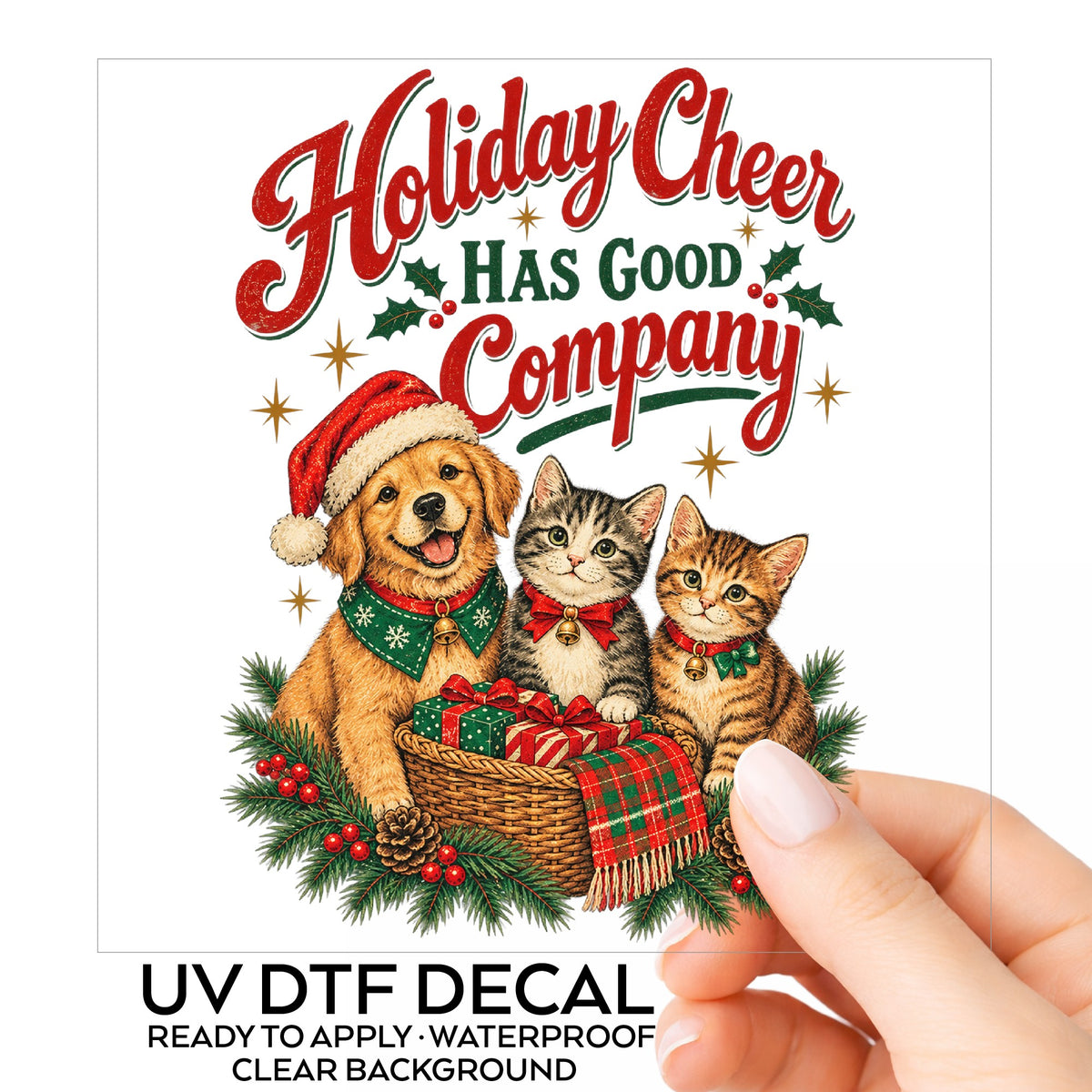 Holiday Cheer Has Good Company Puppy Kittens UV DTF sticker on its backing card, held in hand