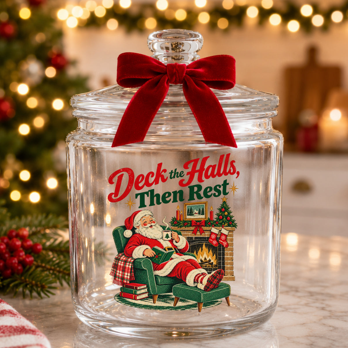 Deck The Halls Then Rest Santa UV DTF sticker applied to a glass candy jar tied with a red bow