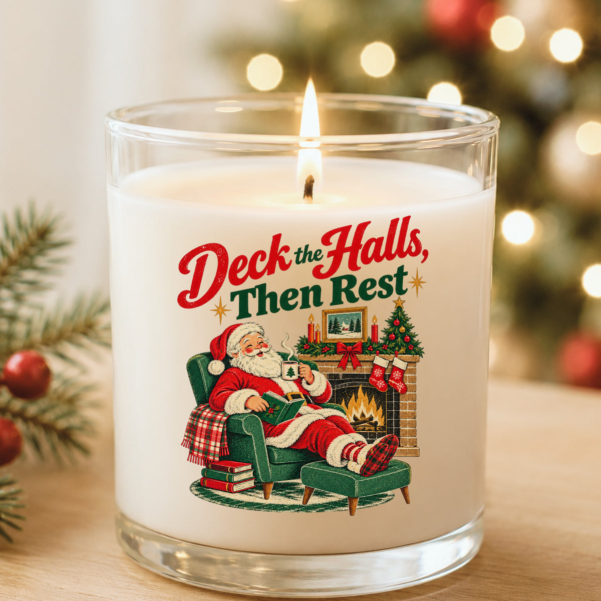Deck The Halls Then Rest Santa UV DTF sticker applied to a white candle in a glass holder near Christmas lights