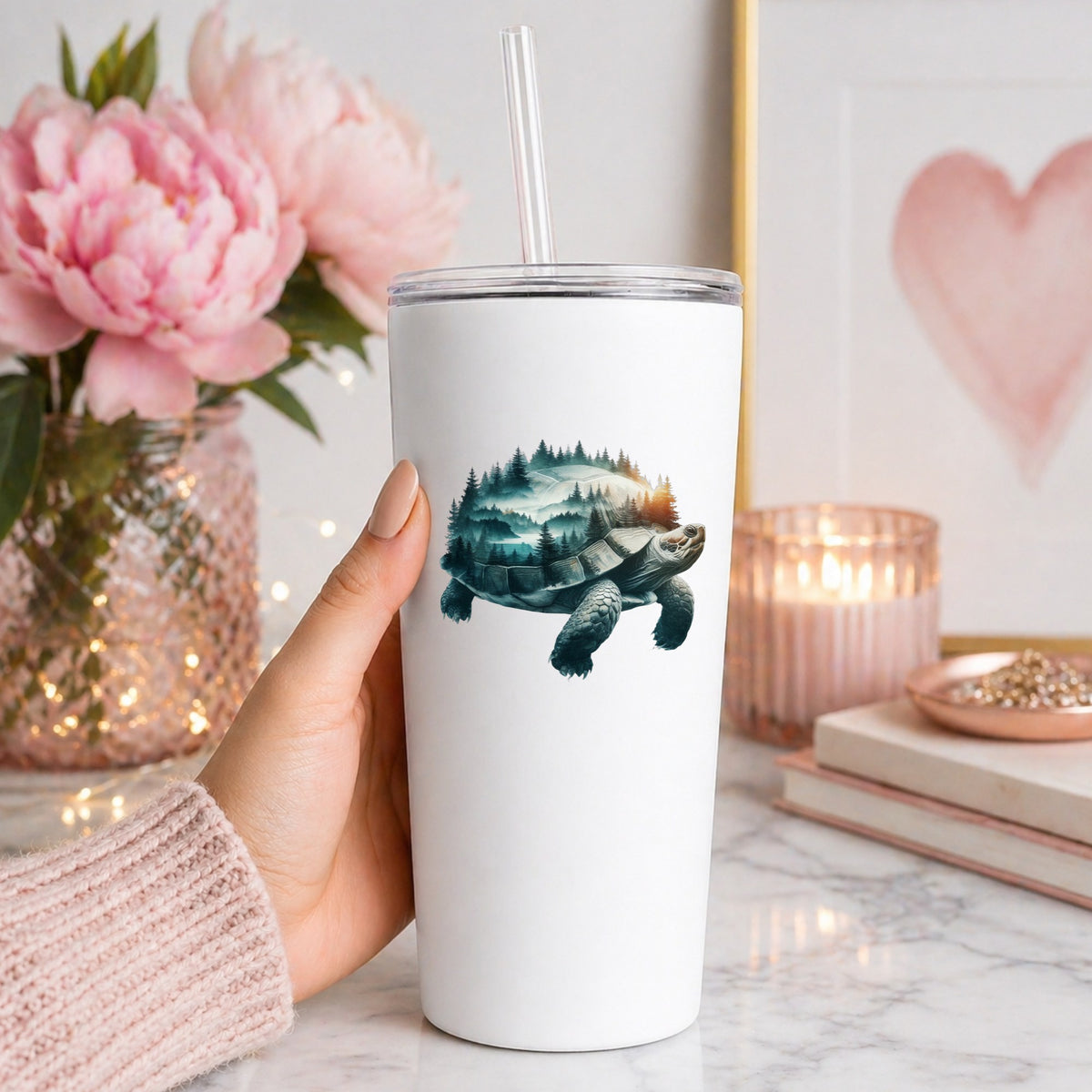 Forest Tortoise UV DTF sticker applied to a white straw tumbler beside pink peonies