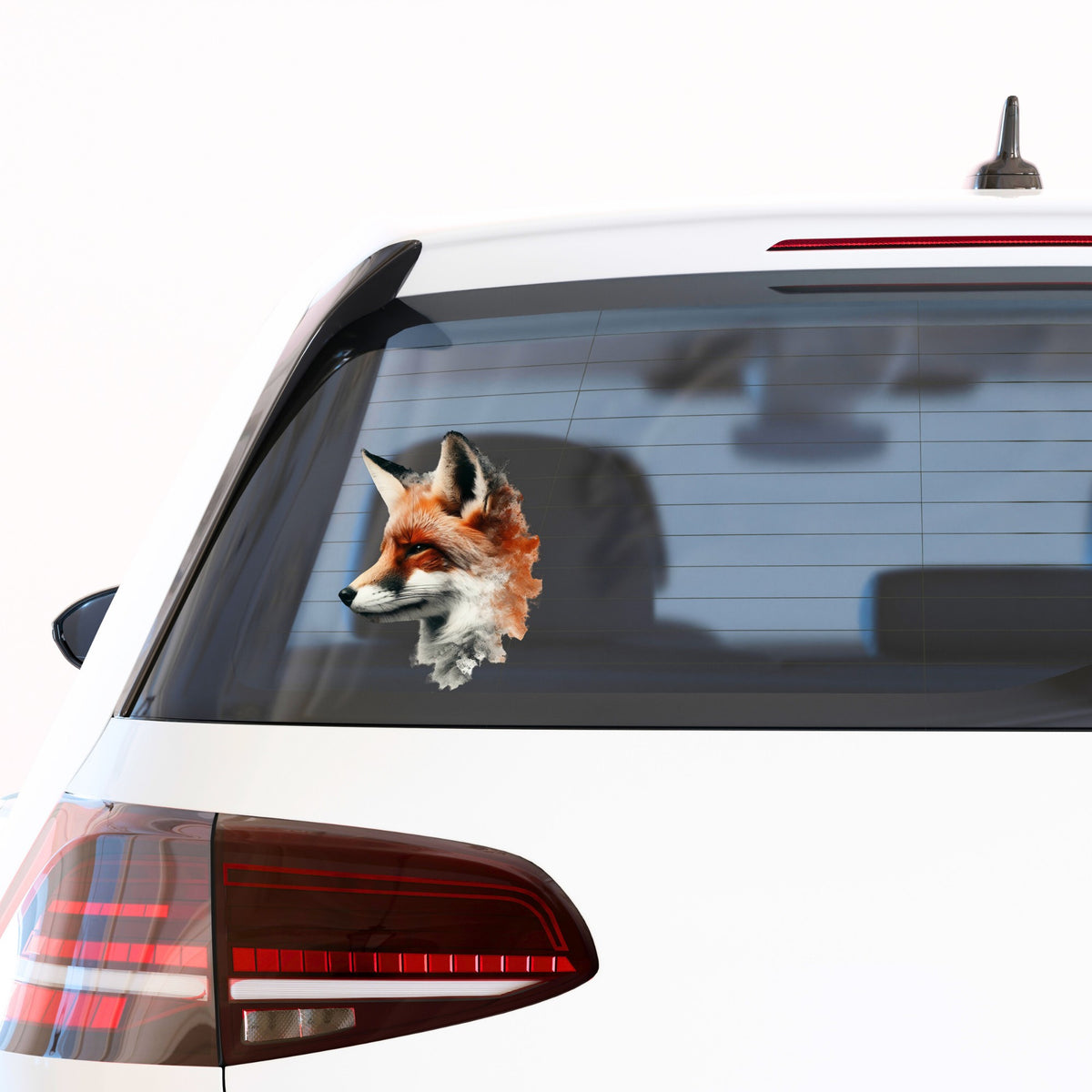Red Fox Head UV DTF sticker applied to the rear window of a white car