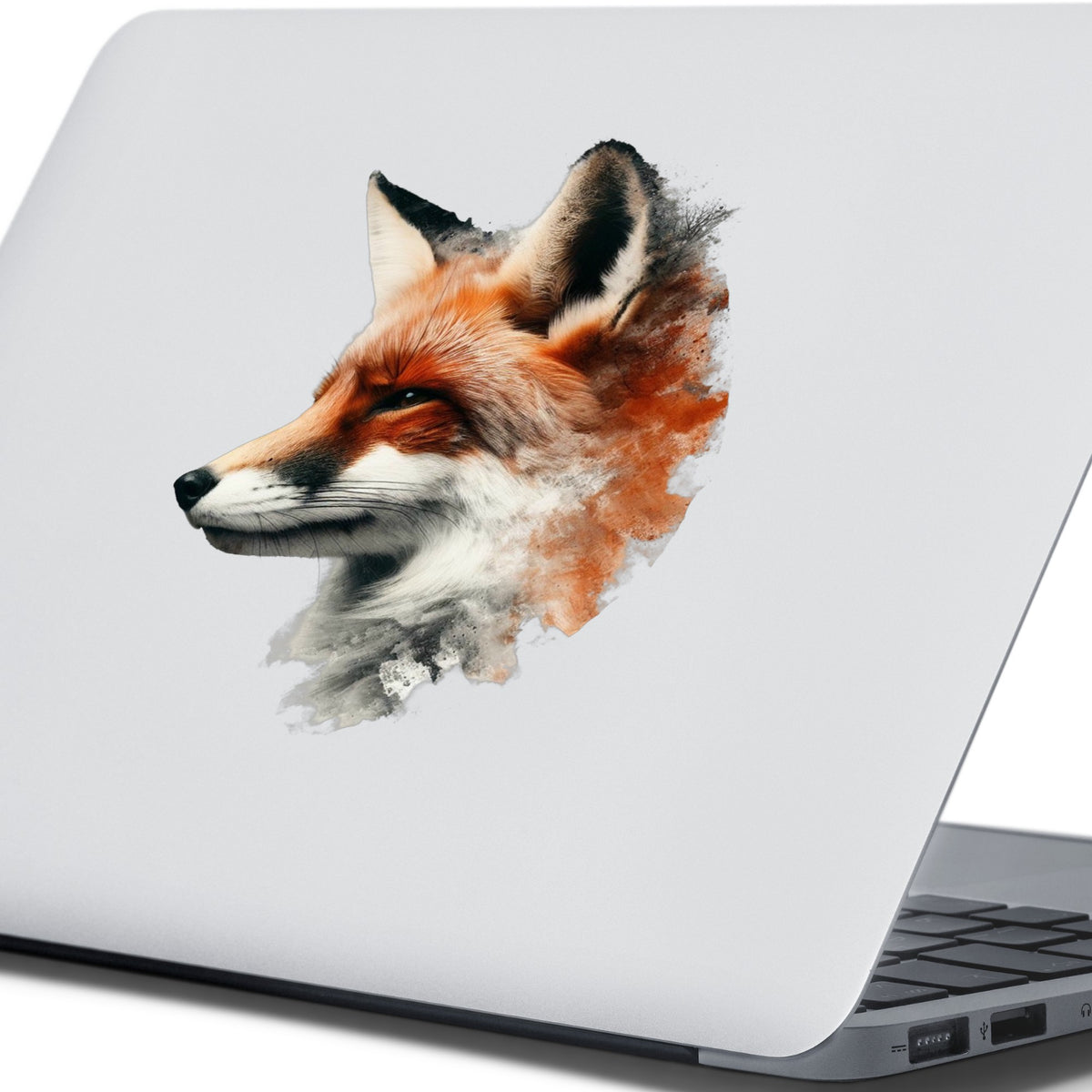 Red Fox Head UV DTF sticker applied to the lid of a silver laptop