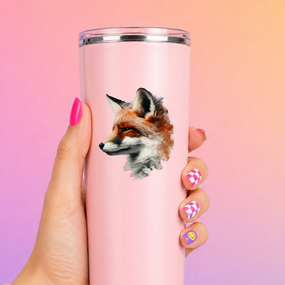 Red Fox Head UV DTF sticker applied to a tall pink tumbler on a pink and orange background