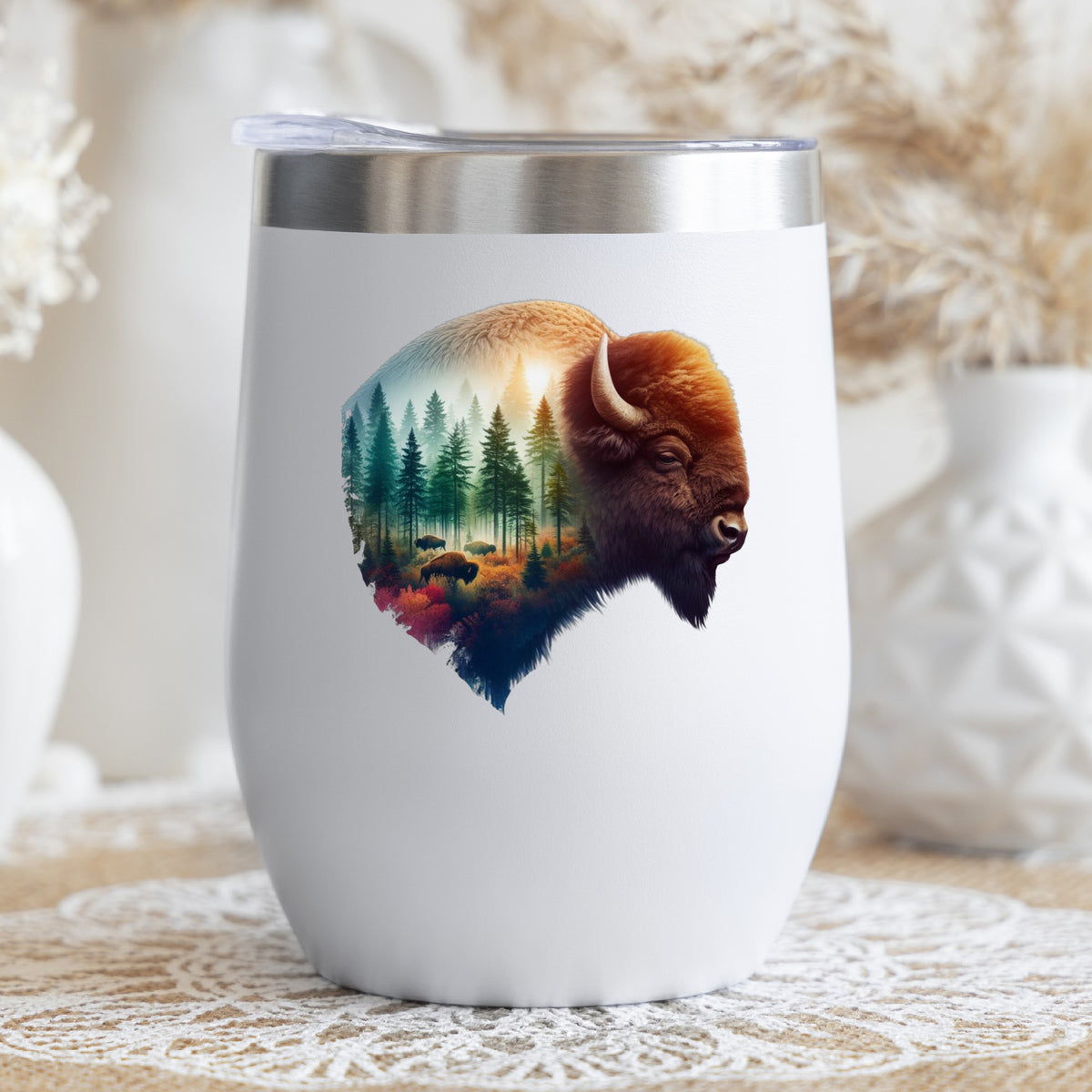 Sunrise Bison UV DTF sticker applied to a white stemless tumbler with a lid