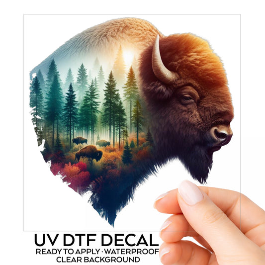 Sunrise Bison UV DTF sticker on its backing card, held in hand