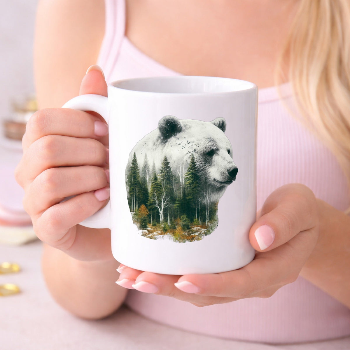 White Bear UV DTF sticker applied to a white coffee mug held in both hands