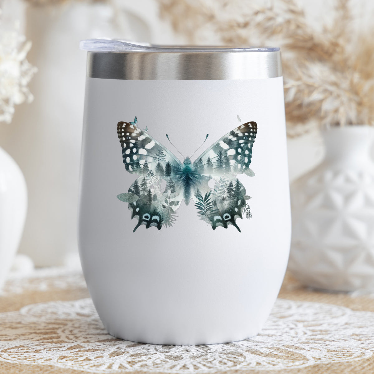 Black White Butterfly UV DTF sticker applied to a white stemless tumbler with a lid