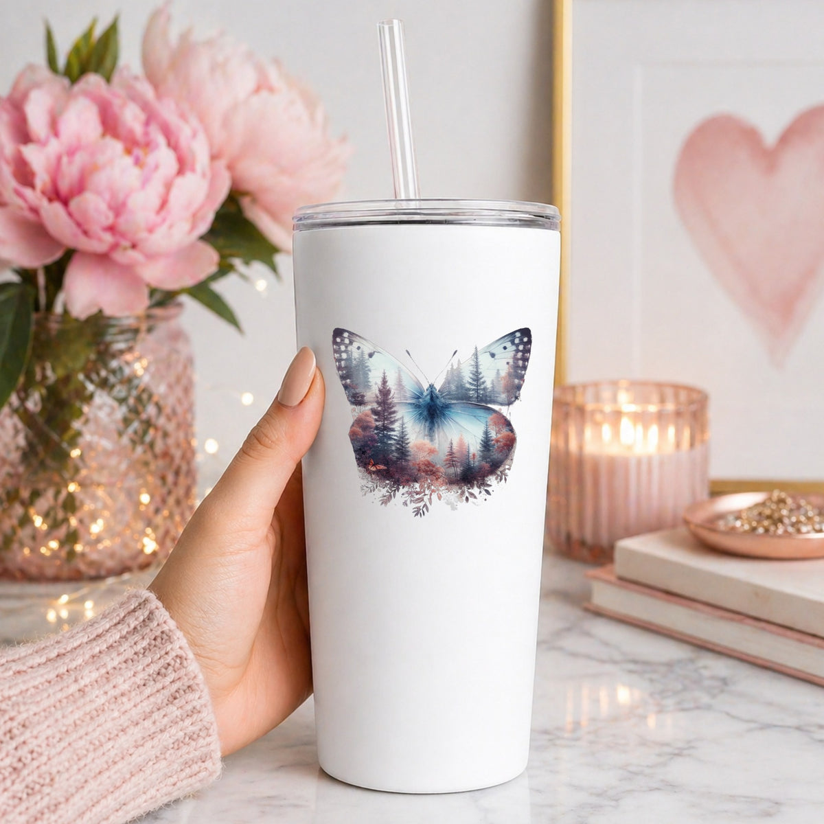 Pink Forest Butterfly UV DTF sticker applied to a white straw tumbler beside pink peonies