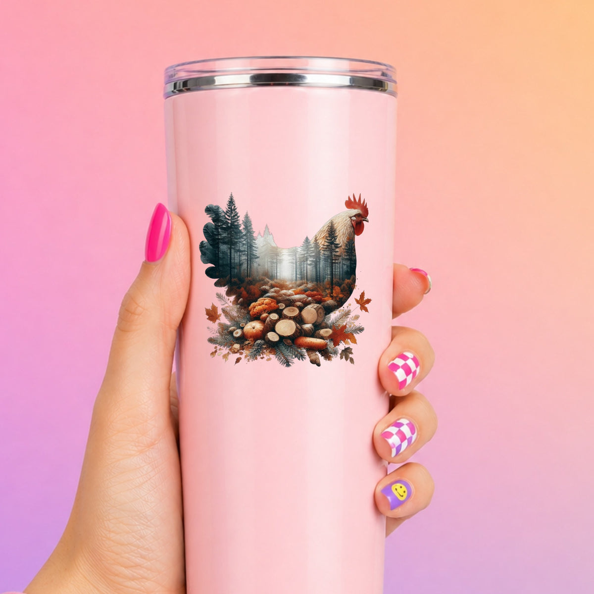Autumn Chicken UV DTF sticker applied to a tall pink tumbler on a pink and orange background