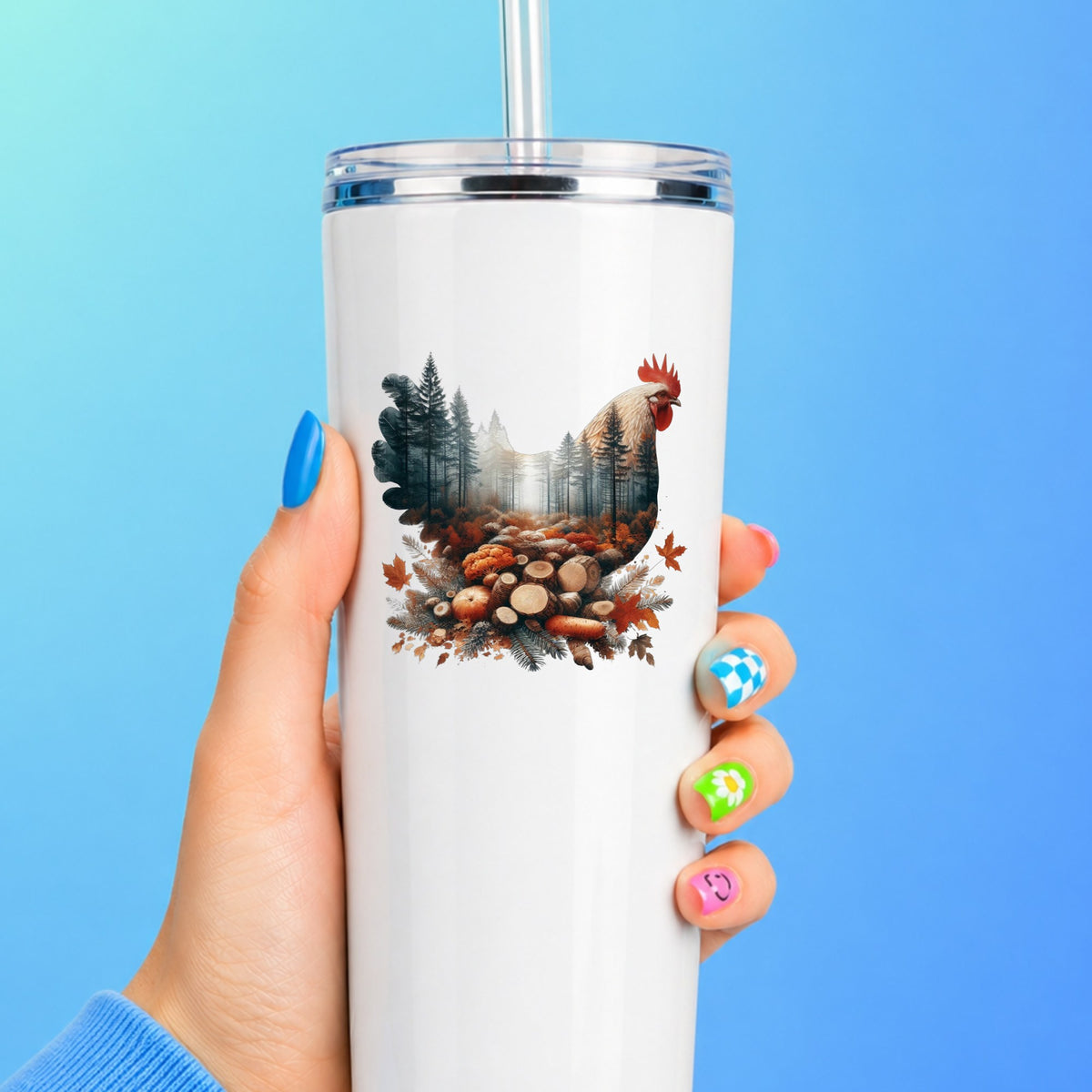 Autumn Chicken UV DTF sticker applied to a white straw tumbler on a blue background