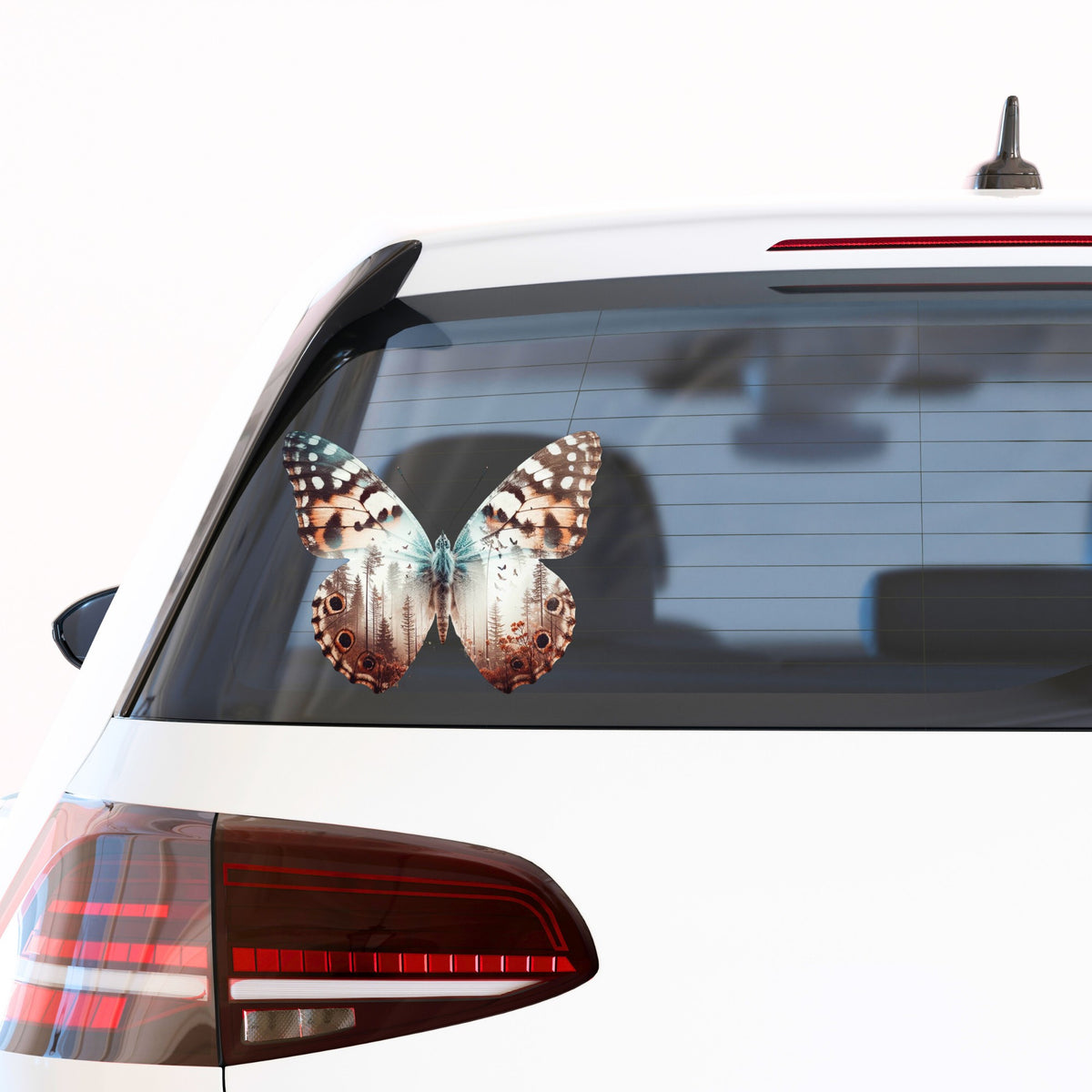 Rust Brown Butterfly UV DTF sticker applied to the rear window of a white car
