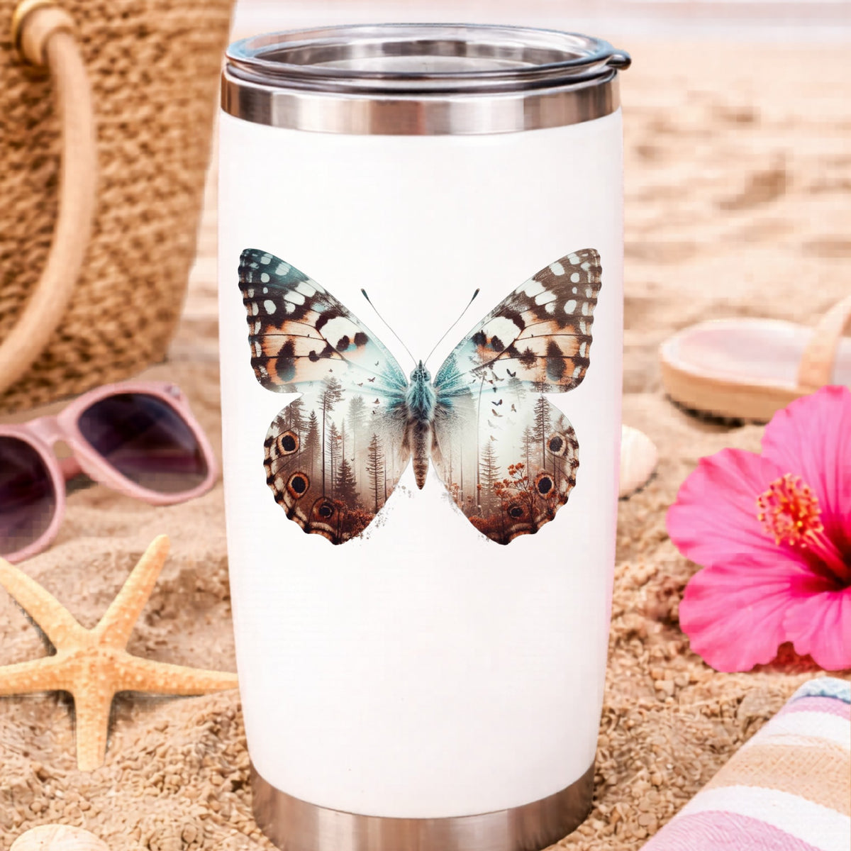 Rust Brown Butterfly UV DTF sticker applied to a white travel tumbler on beach sand