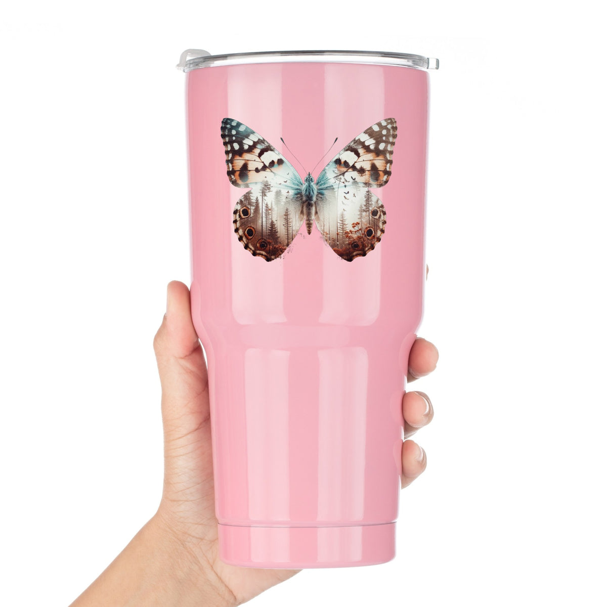 Rust Brown Butterfly UV DTF sticker applied to a pink tumbler held against a white background