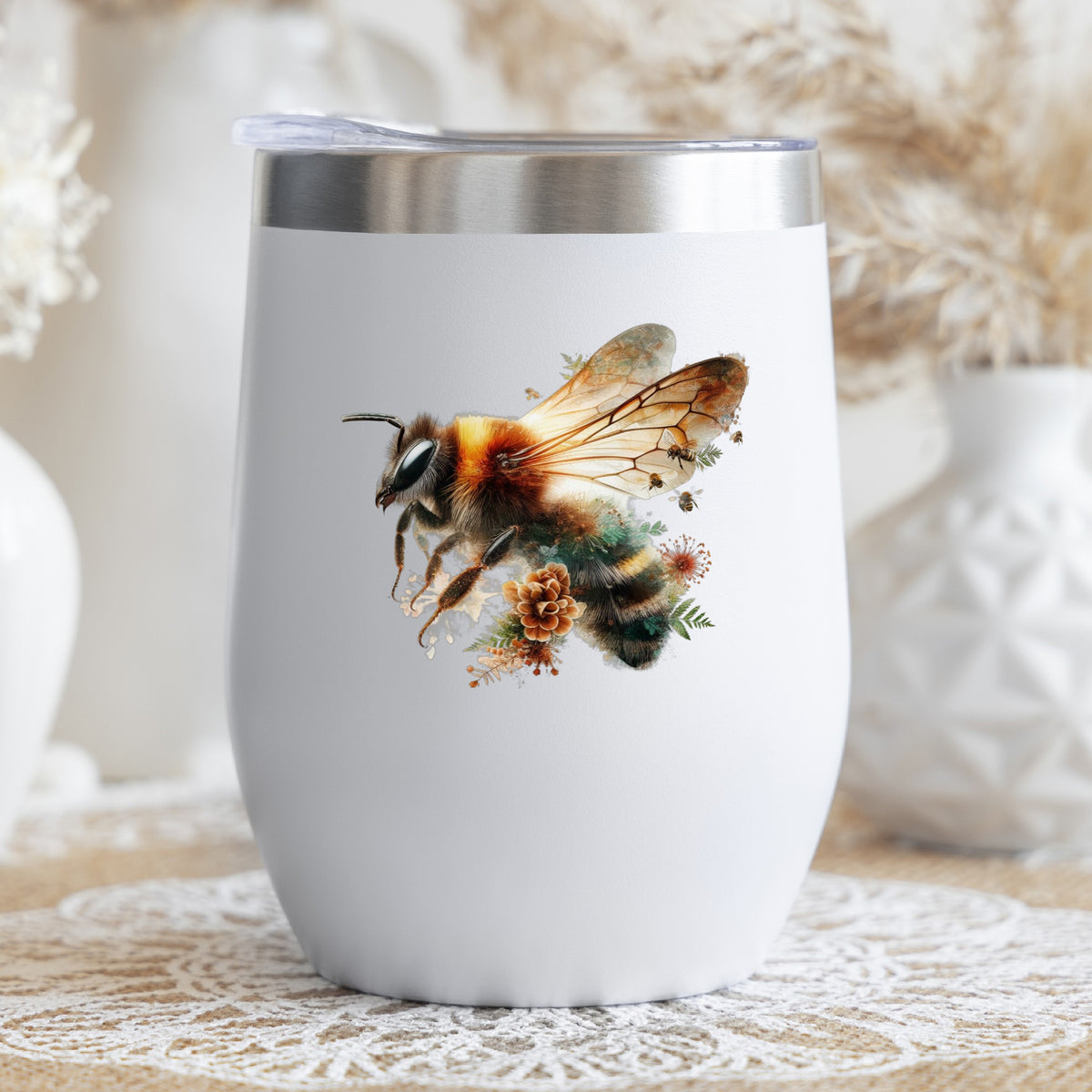Pinecone Bumblebee UV DTF sticker applied to a white stemless tumbler with a lid