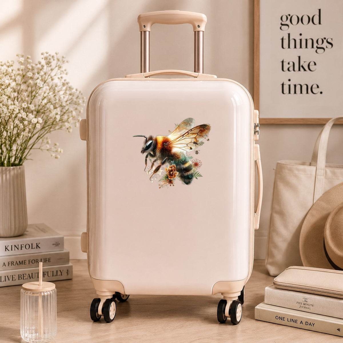 Pinecone Bumblebee UV DTF sticker applied to a cream carry-on suitcase