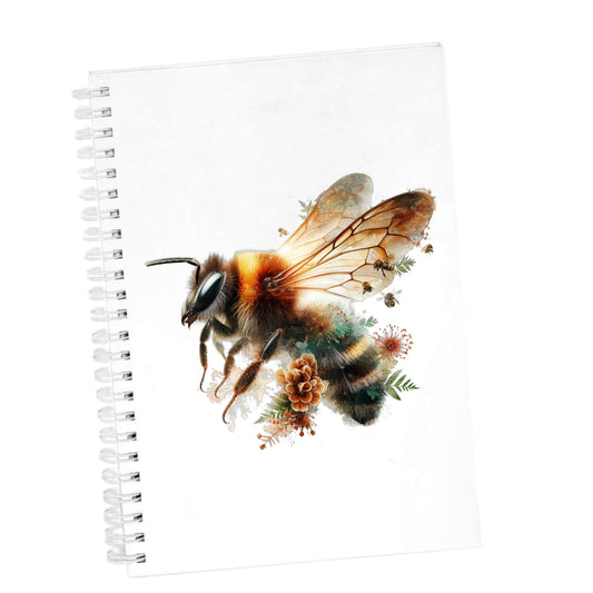 Pinecone Bumblebee UV DTF sticker applied to the cover of a white spiral journal