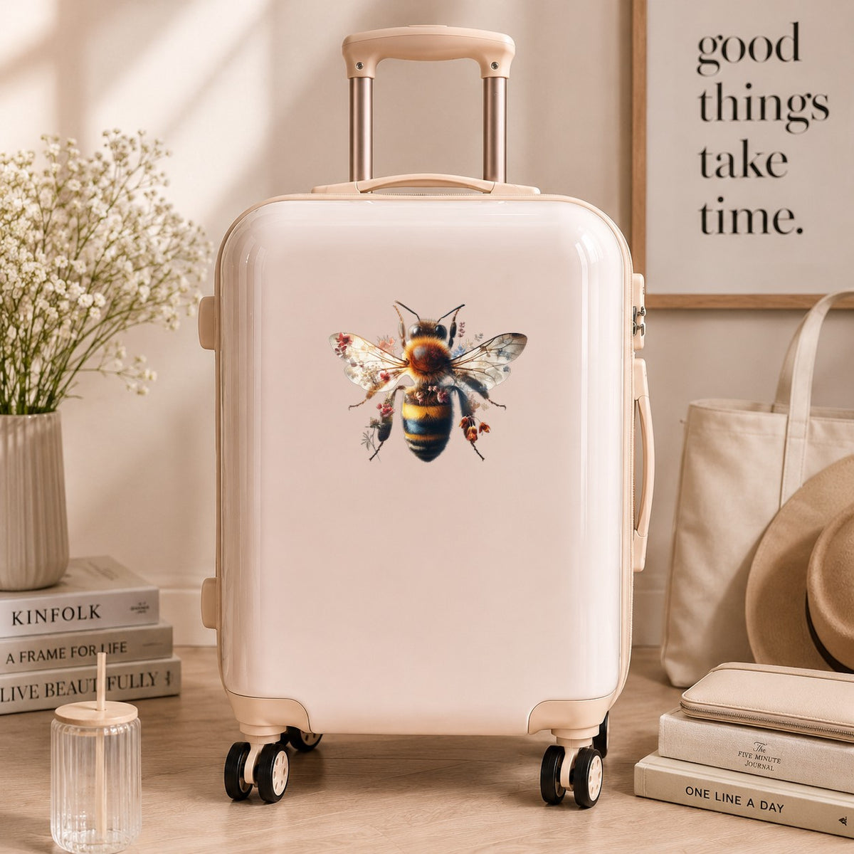 Pink Floral Bee UV DTF sticker applied to a cream carry-on suitcase