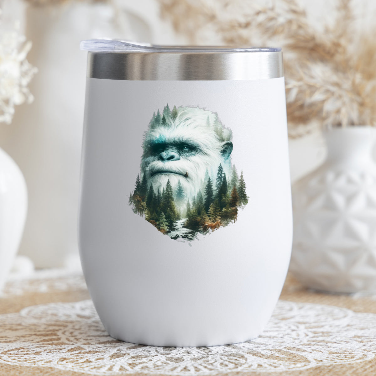 Bigfoot Face UV DTF sticker applied to a white stemless tumbler with a lid