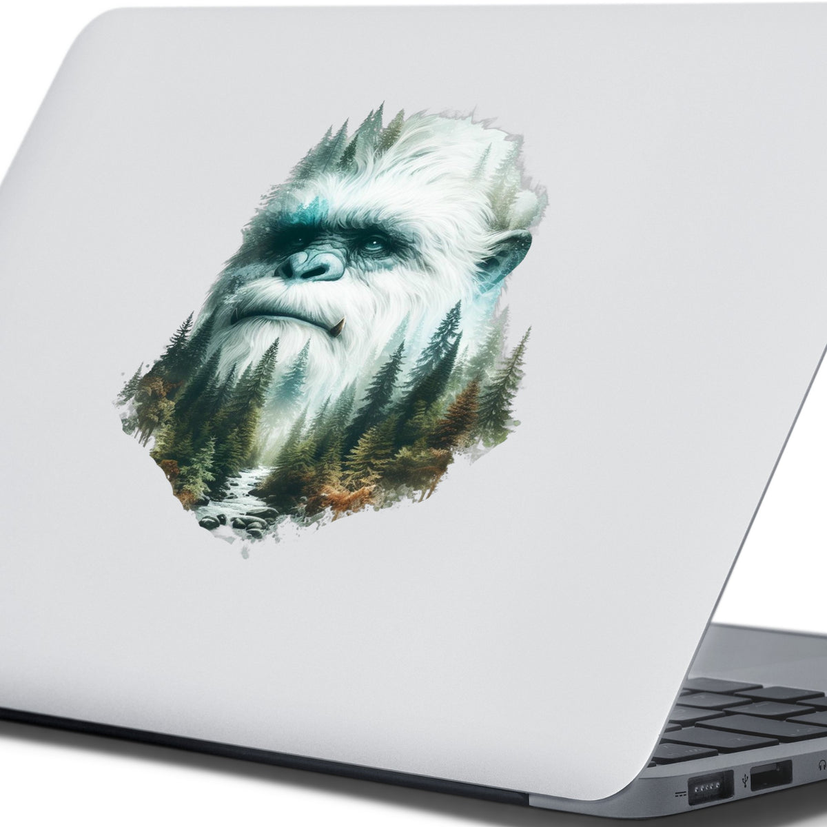 Bigfoot Face UV DTF sticker applied to the lid of a silver laptop