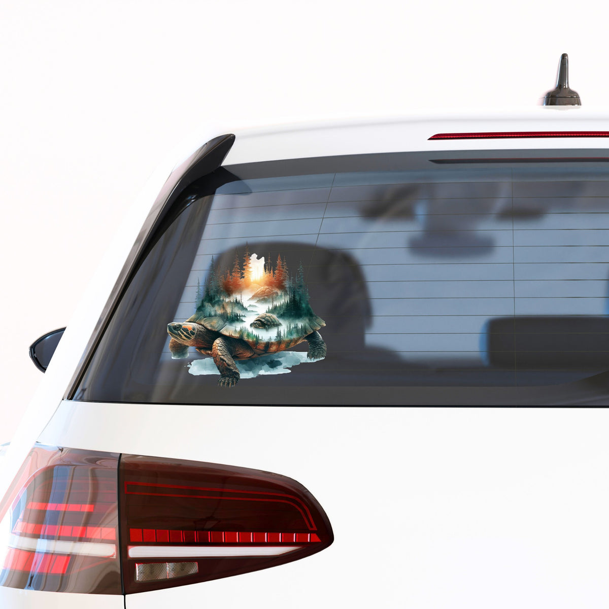 Sunset Turtle UV DTF sticker applied to the rear window of a white car