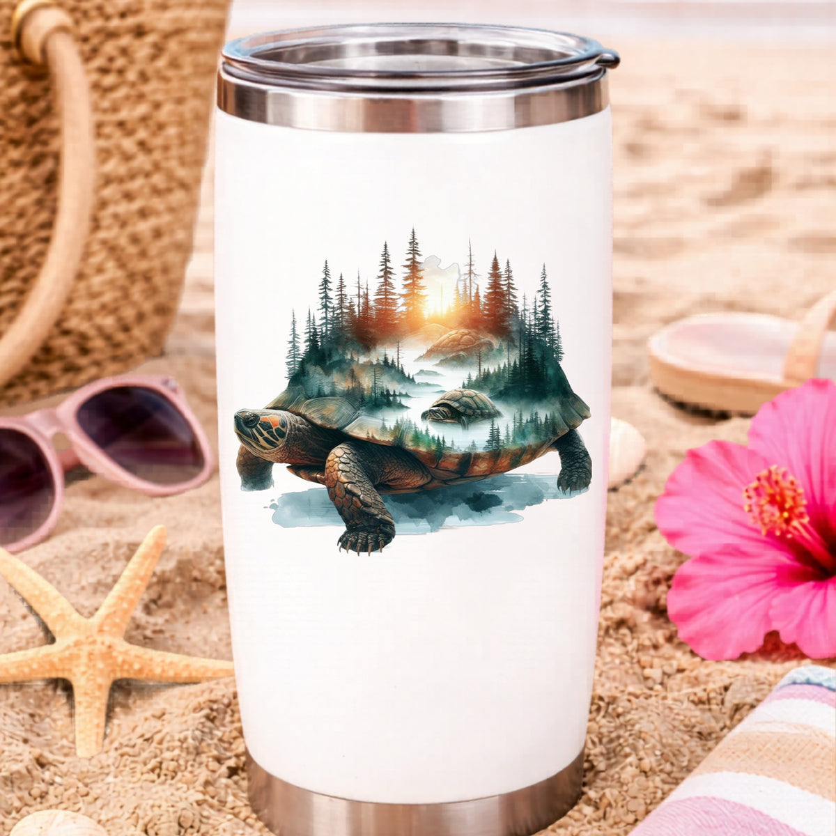 Sunset Turtle UV DTF sticker applied to a white travel tumbler on beach sand