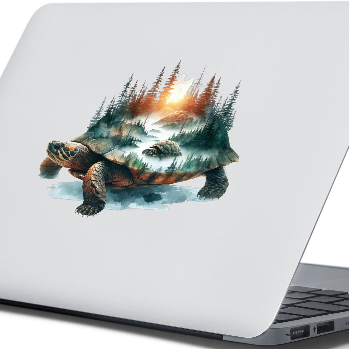 Sunset Turtle UV DTF sticker applied to the lid of a silver laptop