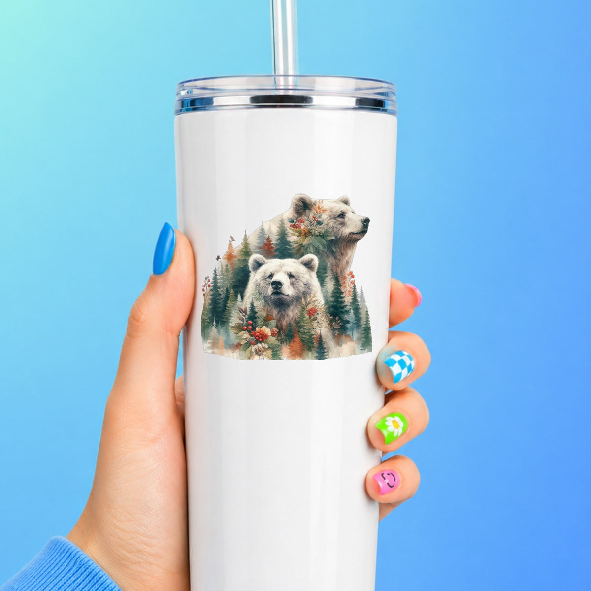 Two Bears UV DTF sticker applied to a white straw tumbler on a blue background