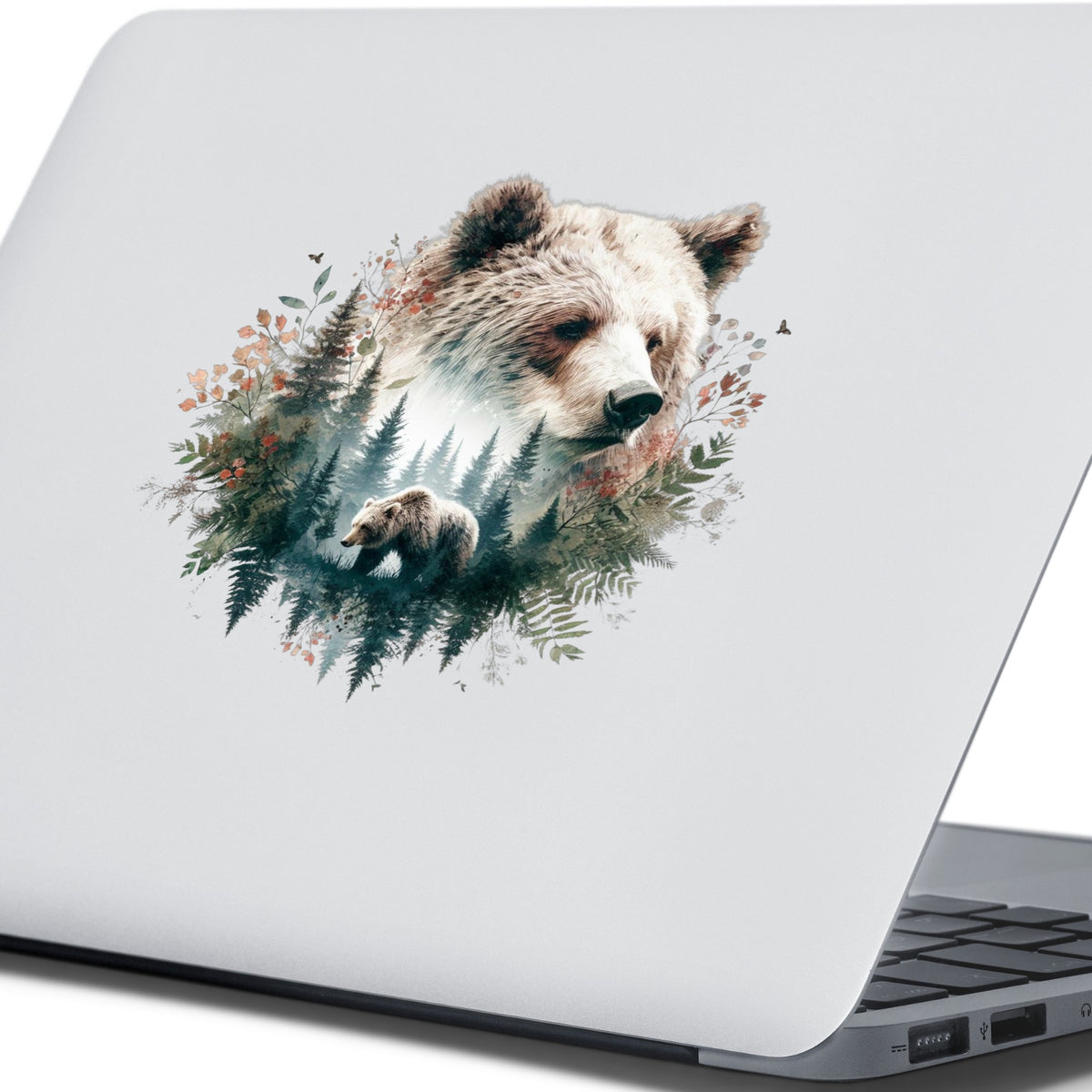 Brown Bear Botanical UV DTF sticker applied to the lid of a silver laptop