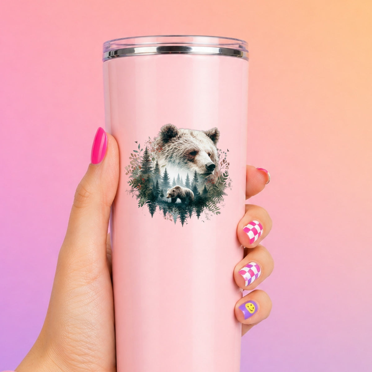 Brown Bear Botanical UV DTF sticker applied to a tall pink tumbler on a pink and orange background