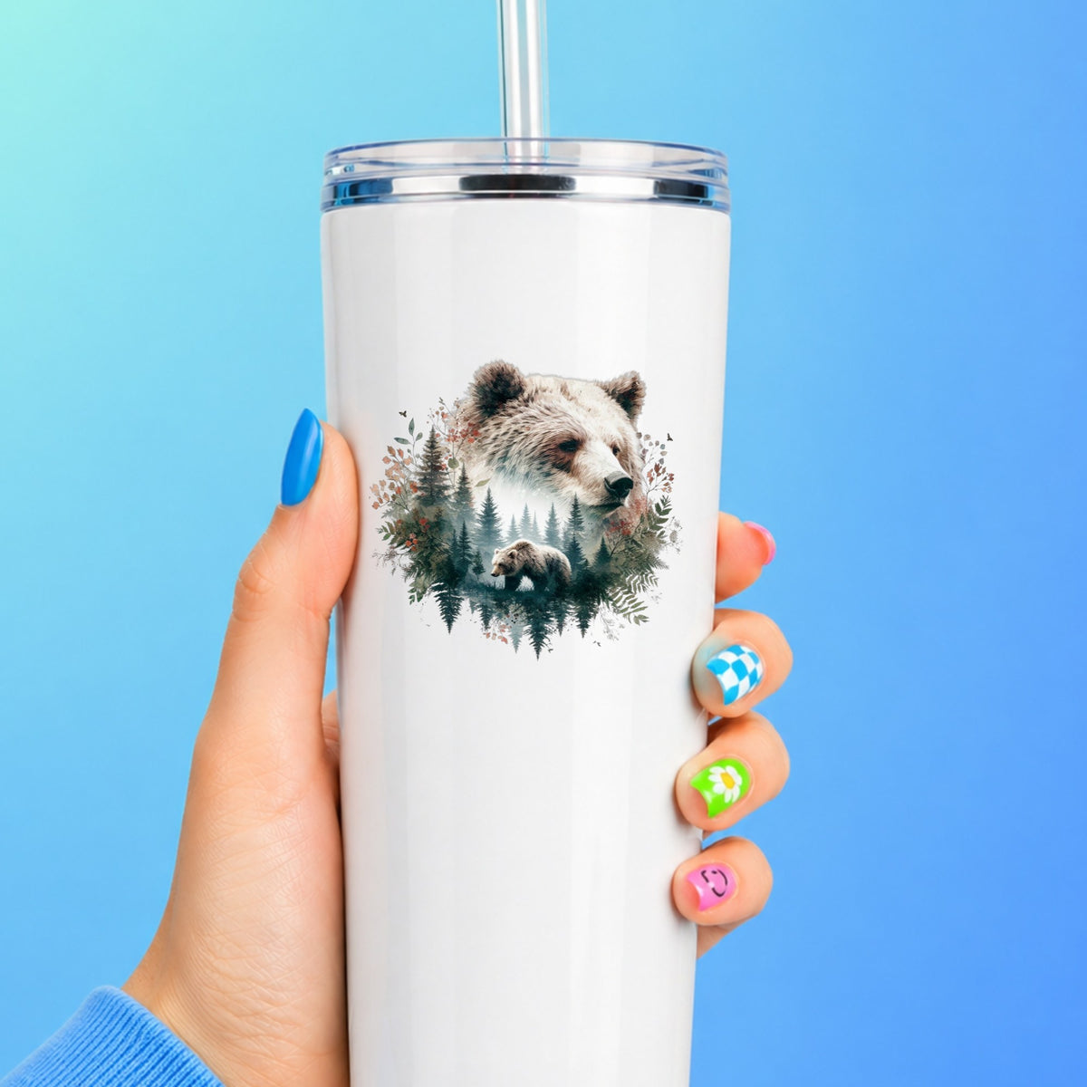 Brown Bear Botanical UV DTF sticker applied to a white straw tumbler on a blue background