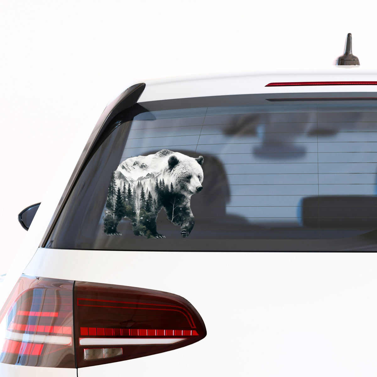 Mountain Bear UV DTF sticker applied to the rear window of a white car