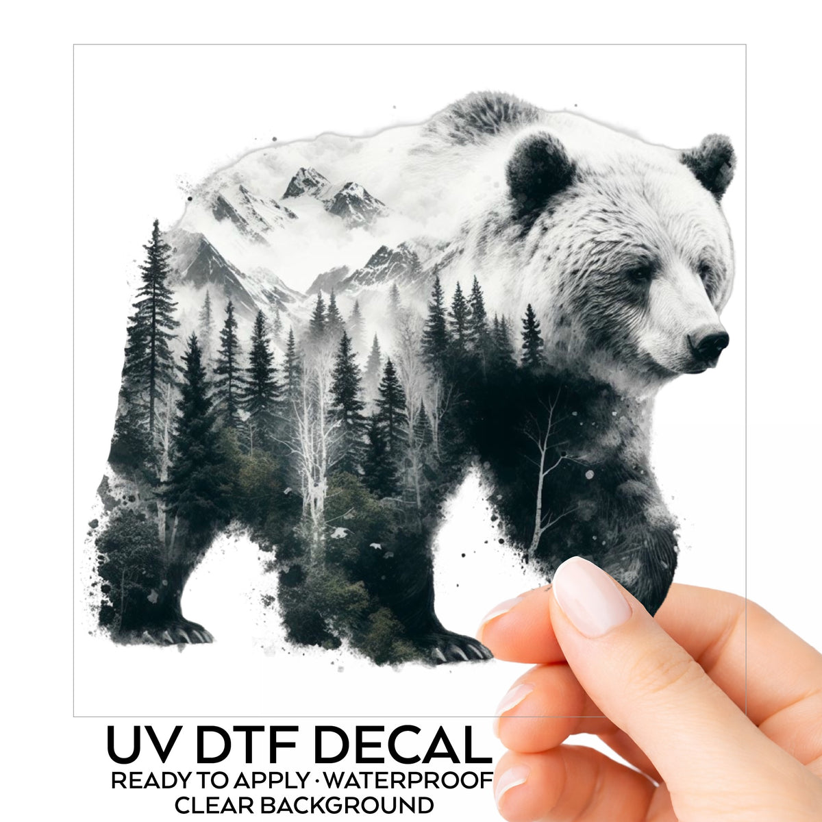 Mountain Bear UV DTF sticker on its backing card, held in hand