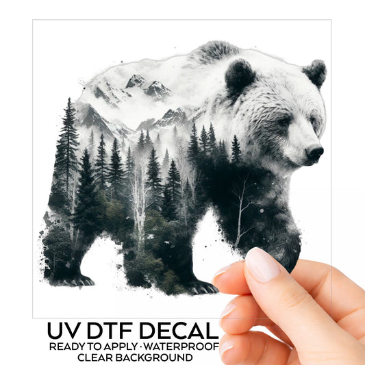 Mountain Bear UV DTF sticker on its backing card, held in hand