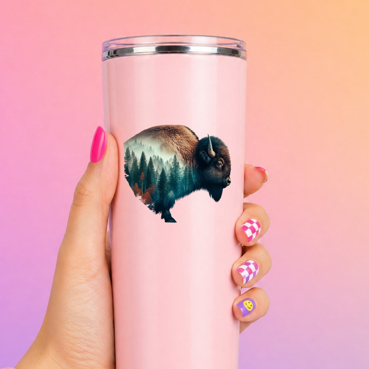 Bison Profile UV DTF sticker applied to a tall pink tumbler on a pink and orange background