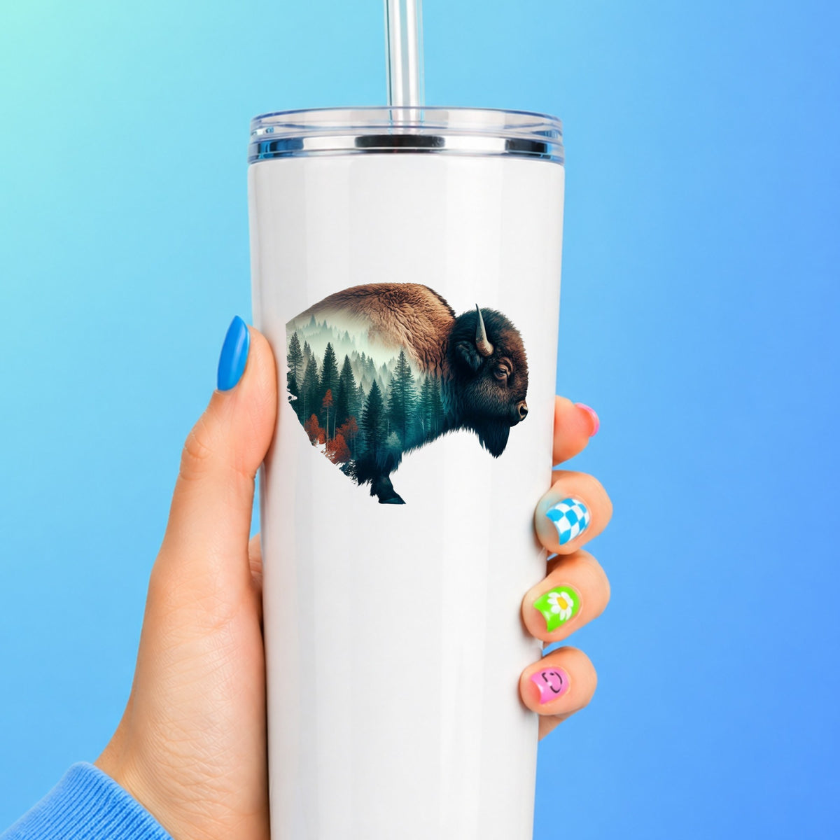 Bison Profile UV DTF sticker applied to a white straw tumbler on a blue background