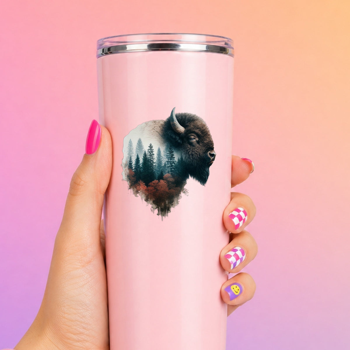 Buffalo Head UV DTF sticker applied to a tall pink tumbler on a pink and orange background