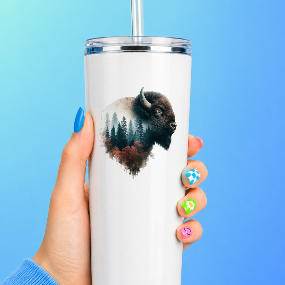 Buffalo Head UV DTF sticker applied to a white straw tumbler on a blue background