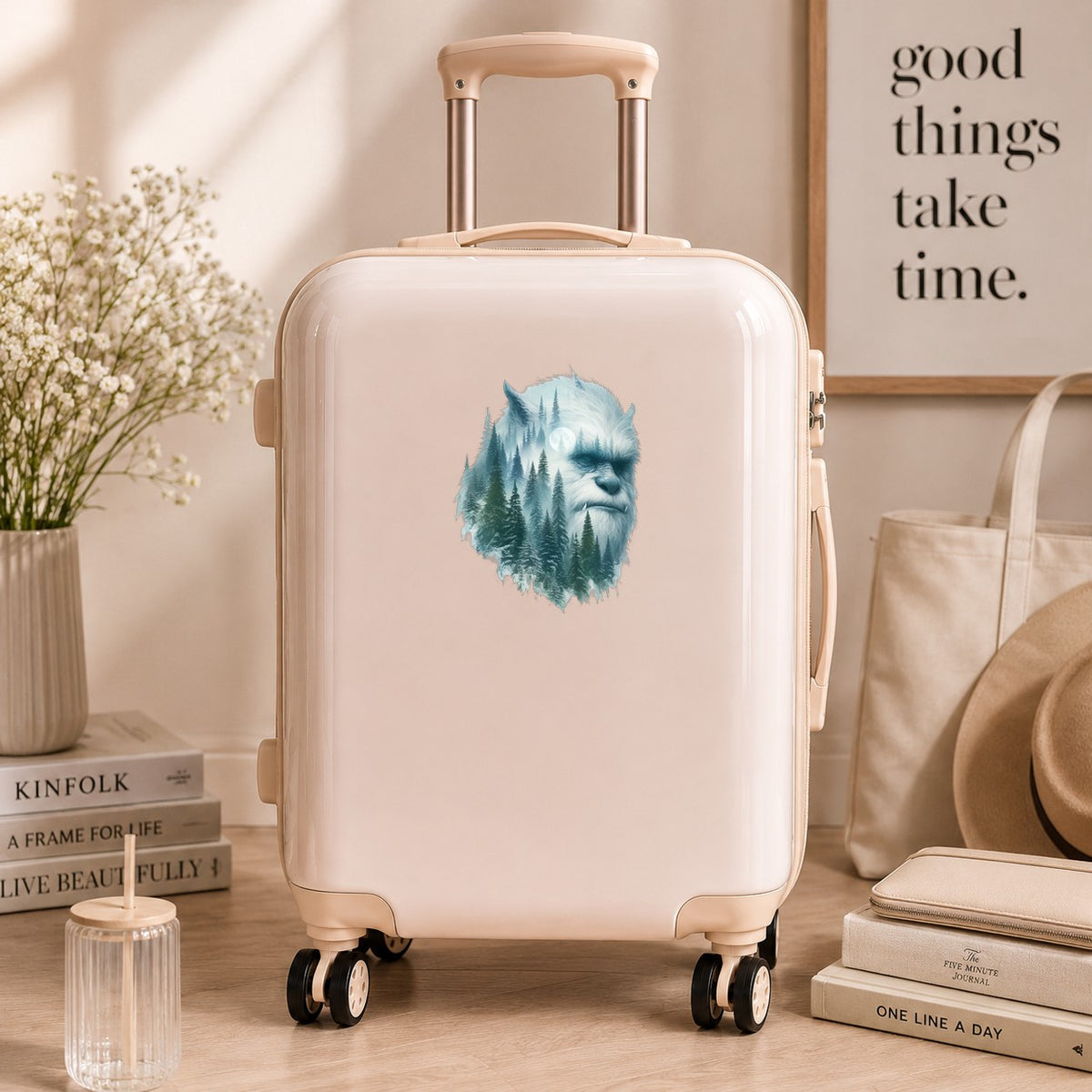 Full Moon Sasquatch UV DTF sticker applied to a cream carry-on suitcase
