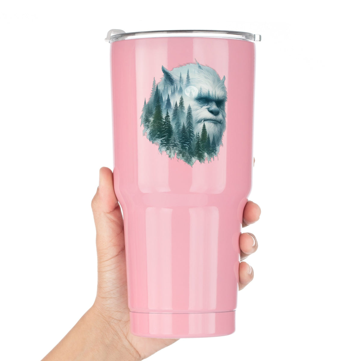 Full Moon Sasquatch UV DTF sticker applied to a pink tumbler held against a white background
