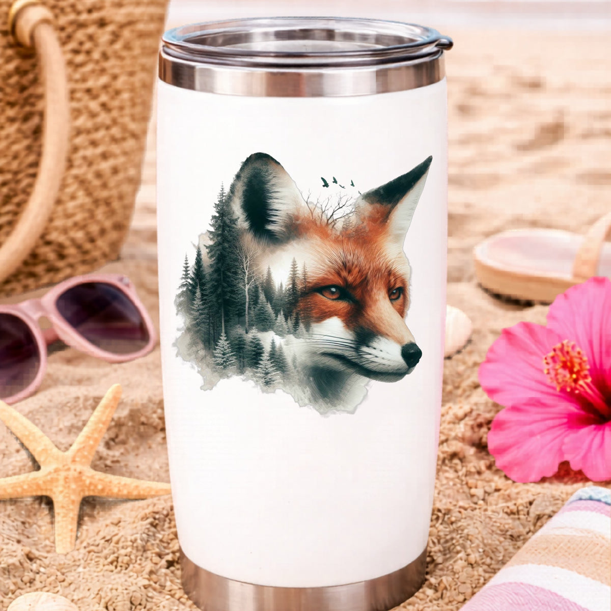 Pine Forest Fox UV DTF sticker applied to a white travel tumbler on beach sand