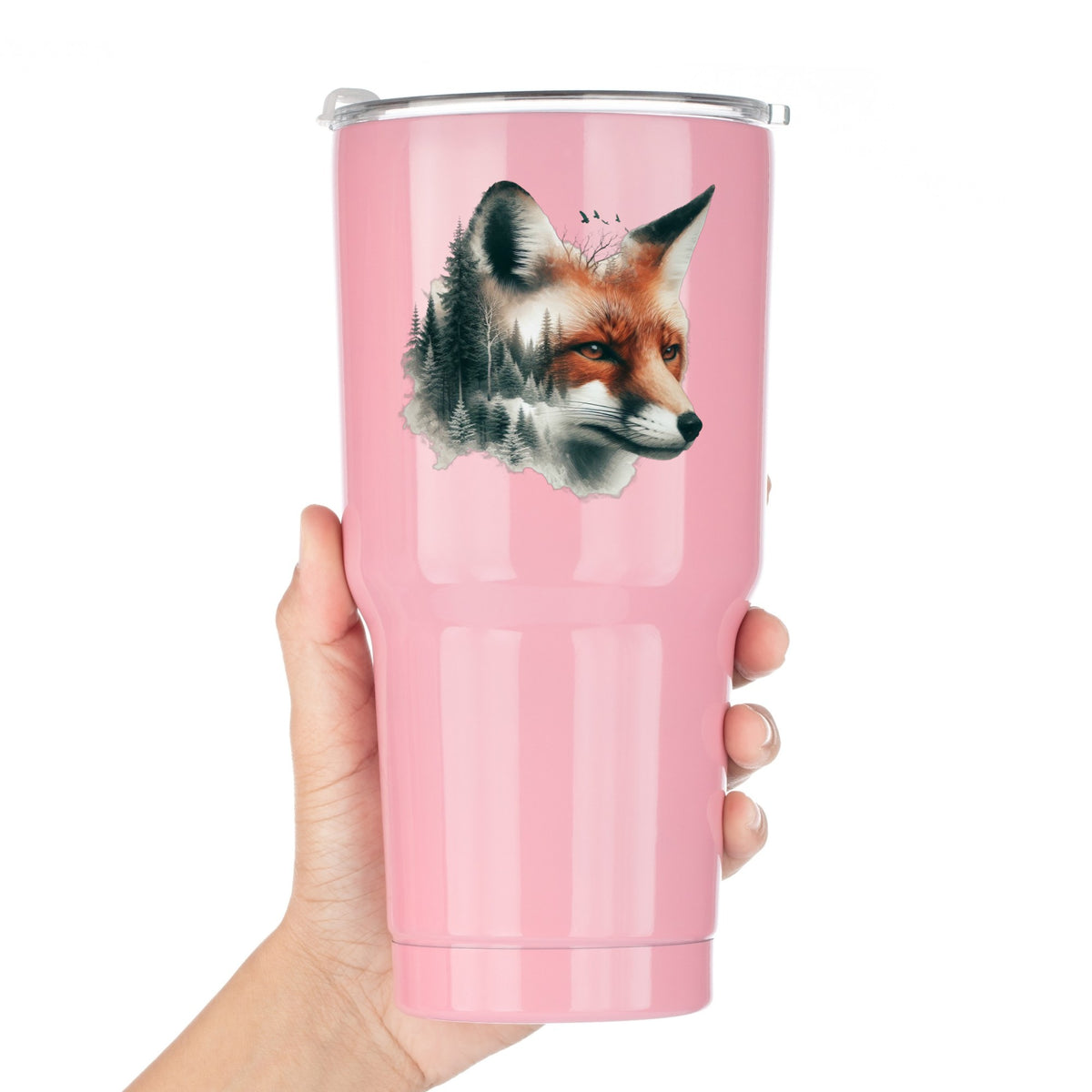 Pine Forest Fox UV DTF sticker applied to a pink tumbler held against a white background
