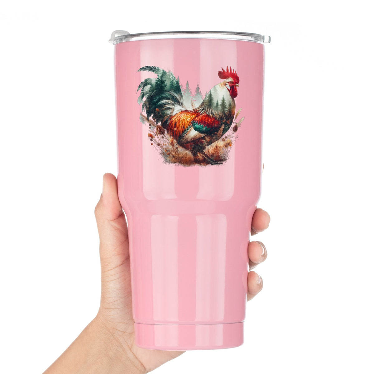 Colorful Rooster UV DTF sticker applied to a pink tumbler held against a white background