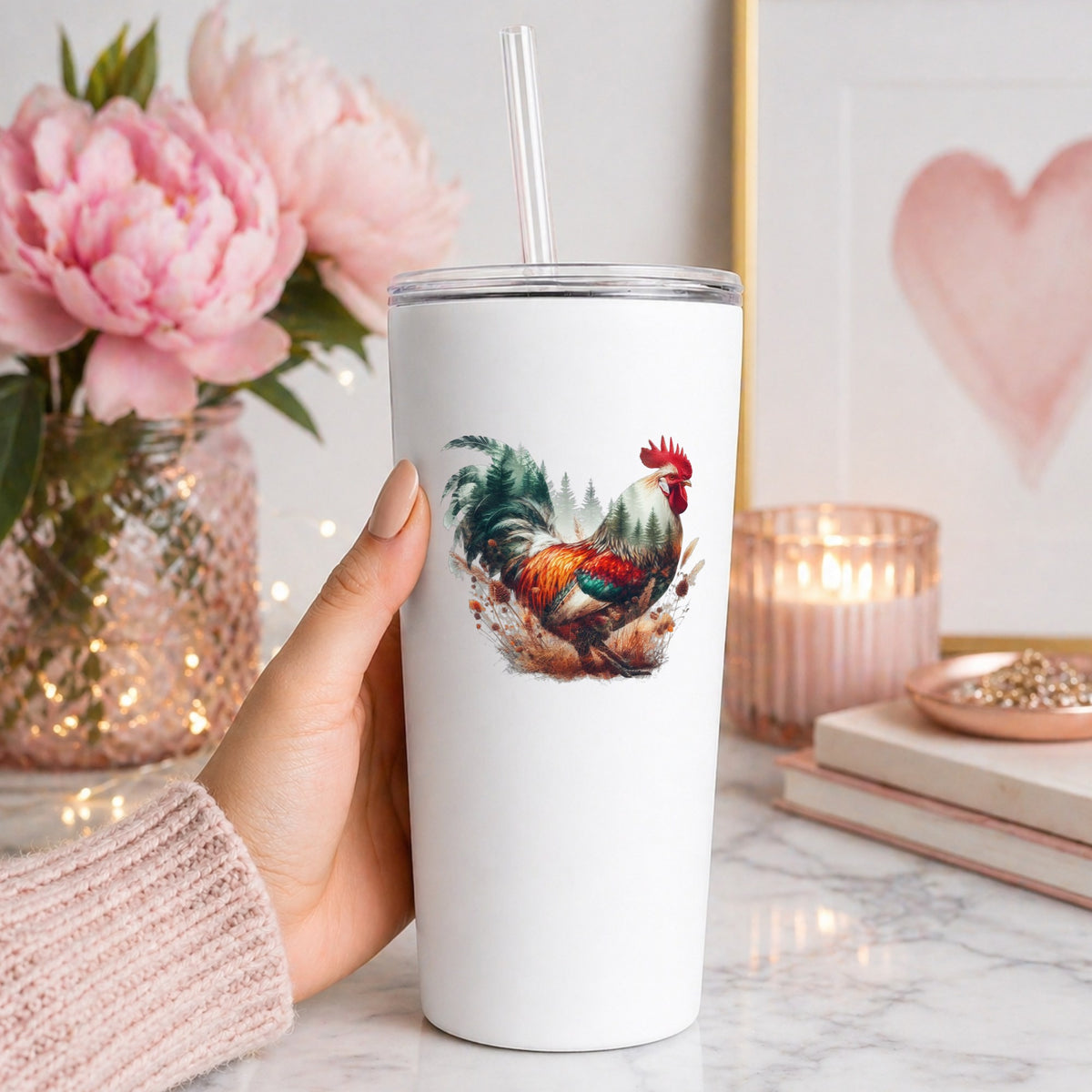 Colorful Rooster UV DTF sticker applied to a white straw tumbler beside pink peonies